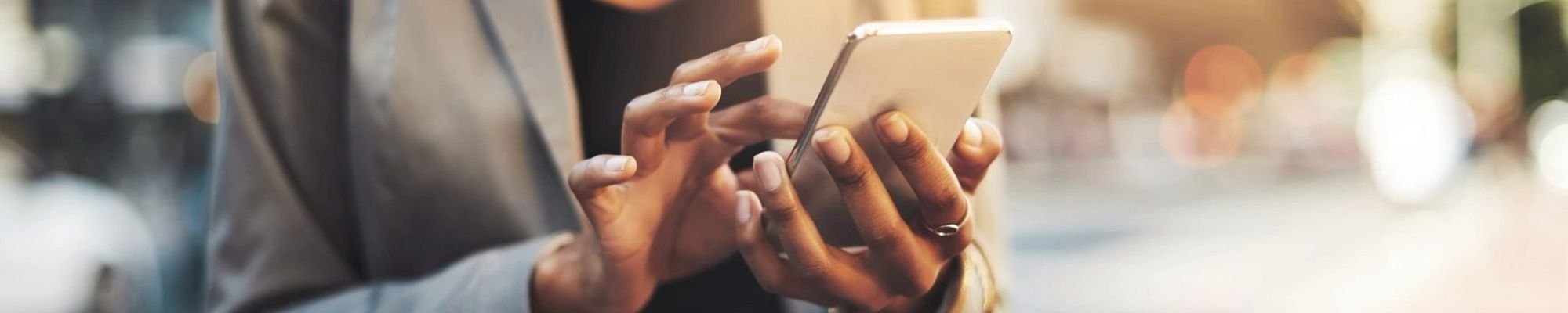 person holding phone outdoors from Nationwide Carpet in Mount Juliet