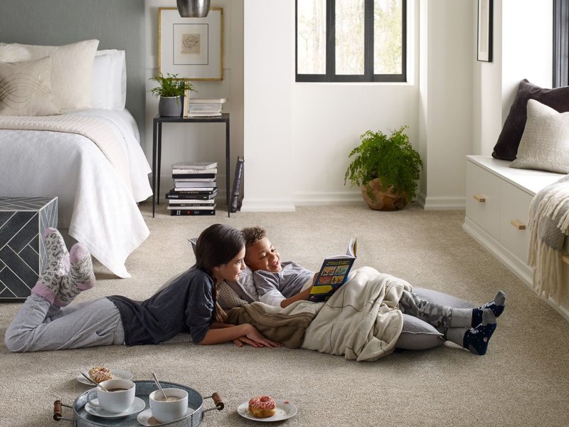 kids reading on bedroom floor from Nationwide Carpet in Mount Juliet